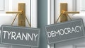 Democracy or tyranny as a choice in life - pictured as words tyranny, democracy on doors to show that tyranny and democracy are