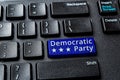 Democratic Party blue key on a decktop pc keyboard. United States elections and politics concepts. Voting online for Democratic Royalty Free Stock Photo