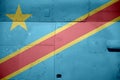 Democratic Republic of the Congo flag depicted on side part of military armored helicopter closeup. Army forces aircraft