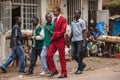 Congo stylish man in red suit congolese society of les sapeurs