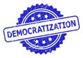 DEMOCRATIZATION Blue Rosette Stamp with Grunged Surface Royalty Free Stock Photo