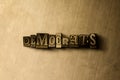 DEMOCRATS - close-up of grungy vintage typeset word on metal backdrop