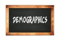 DEMOGRAPHICS text written on wooden frame school blackboard