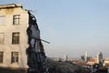 Demolished old building remains with city view