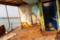 Demolished and rusty deck of a cargo ship with old bridge run aground on the Al Hamriyah beach in Umm Al Quwain, UAE Royalty Free Stock Photo