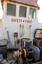 Demolished and rusty deck of a cargo ship with old bridge (wheelhouse), \