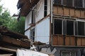 Demolition of a building in deconstruction site with debris, remains and ruined walls