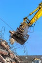 Demolition crane dismantling a building Royalty Free Stock Photo