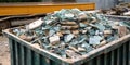 Demolition debris in container with shattered remnants and construction waste ready for recycling. Royalty Free Stock Photo