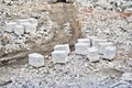 Demolition and dismantling of the remnants of the large industrial enterprise. The bricks are placed on pallets for further transp Royalty Free Stock Photo