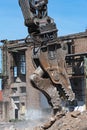 Demolition grapple of an excavator on a construction site during