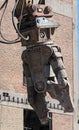 Demolition grapple of an excavator on a construction site during