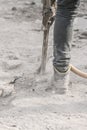 Demolition hammer. Male working in construction industry. Repairing and building a new road. Royalty Free Stock Photo