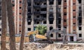 Demolition of a high-rise building. The collapse of a residential building. Construction work on the demolition of multi-storey Royalty Free Stock Photo