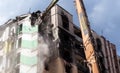 Demolition of a high-rise building. The collapse of a residential building. Construction work on the demolition of multi-storey Royalty Free Stock Photo