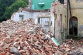 demolition of an old house, half done