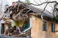 Demolition of an old two-story wooden house