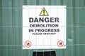 Demolition in progress keep out sign at construction building site