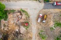 Demolition site top view. heavy excavator loading a debris and rubble into a dumper truck