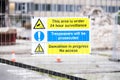 Demolition site building collapse hazard danger sign