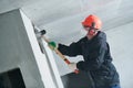 Demolition work and rearrangement. worker with sledgehammer destroying wall Royalty Free Stock Photo