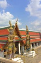 Demon gods, Yaksha, guarding the Temple of Emerald Buddha in Bangkok, Thailand