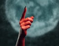 Demon hand pointing upward Royalty Free Stock Photo