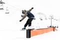Wallride Balance. Snowboarder Executes Tricks on the Slopes. Royalty Free Stock Photo