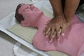 Demonstration of artificial respiration using a dummy, medical concept, emergency rescue training. Royalty Free Stock Photo