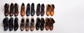 Demonstration of a collection of models of classic shoes in a row, white background. AI generated.