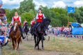 Demonstration of a Cossack girl on a horse for guests and spectators of the festival