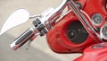 Demonstration of modern red motorcycle in outdoor motorbike exhibition, display Royalty Free Stock Photo