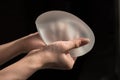 Silicone implant of the female breast during the demonstration o