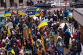 Demonstration support of Ukraine and against the Russian aggression. Protesters, holding banners and Ukrainian flags, against Russ