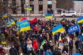 Demonstration support of Ukraine and against the Russian aggression. Protesters, holding banners and Ukrainian flags, against Russ