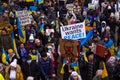 Demonstration support of Ukraine and against the Russian aggression. Protesters, holding banners and Ukrainian flags, against Russ