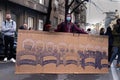 Demonstrations of Students in Serbia, young man is holding sarcastic sign which says in Serbia: \