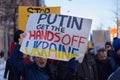 Demonstrator in a rally against RussiaÃ¢â¬â¢s military aggression of Ukraine carrying Putin get the hands off Ukraine si