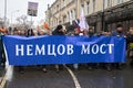 Demonstrators carrying a big banner: Nemtsov Bridge on the Nemtsov memory march in Moscow