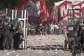 Demonstrators clash with riot police