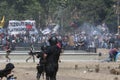 Demonstrators clash with riot police