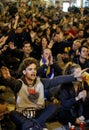 Demonstrators gesture protesting front of Spain Police in Laietana strret in Barcelona vertical