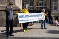 Demonstrators hold a sign saying 'Make Monarchy History' ahead of the King's Coronation in the UK.