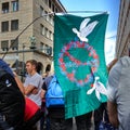 Demonstrators of the peace movement mingle with the protest march against the Corona restriction