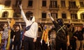 Hooded demonstrators protesting in Laietana street in Barcelona