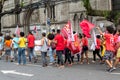 Demonstrators walk with posters, banners and flags during the Crespo Empowerment March in Salvador, Bahia