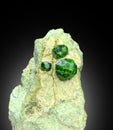 Demontoid green garnet crystals on matrix from iran