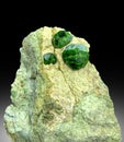 Demontoid green garnet crystals on matrix from iran Royalty Free Stock Photo