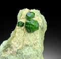 Demontoid green garnet crystals on matrix from iran