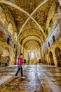 Demre, Turkey - September 4, 2016 - Girls walks across the vestibule of the church of St Nicholos